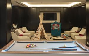a pool table with cue balls and a pyramid at Four Seasons Hotel Tunis in Gammarth