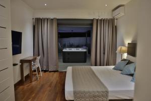 Ένα ή περισσότερα κρεβάτια σε δωμάτιο στο Villa Blue Lagoon - Perle des Salines +22 φωτογραφίες