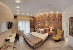Säng eller sängar i ett rum på Hotel Prinz Anton
