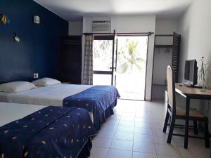 Postel nebo postele na pokoji v ubytování Hotel D'Anatureza