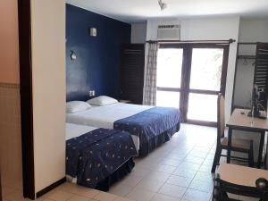 Postel nebo postele na pokoji v ubytování Hotel D'Anatureza + 37 fotografií