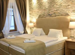 Postel nebo postele na pokoji v ubytování Hotel Torwirt
