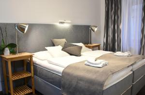 Postel nebo postele na pokoji v ubytování Hotel Torwirt