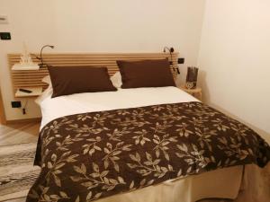 Postel nebo postele na pokoji v ubytování La Corte B&B