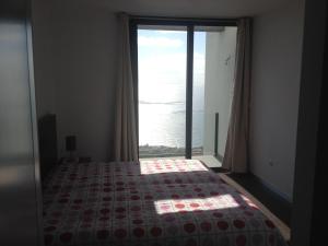 Giường trong phòng chung tại Villa Girasol