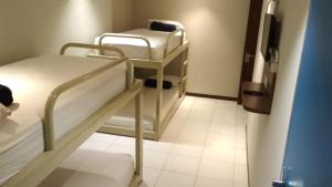 Letto o letti in una camera di Subwow Hostel
