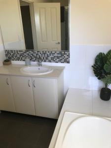 A bathroom at 4x3 Townhouse in Rivervale