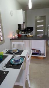 a kitchen with a table with a plate on it at River Cottage Eagle Point in Eagle Point