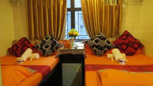 Llit o llits en una habitació de Paris Guest House (D2, 10/F)