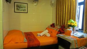 Llit o llits en una habitació de Paris Guest House (D2, 10/F)