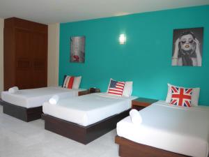Forum House Hotel Krabi客房内的一张或多张床位