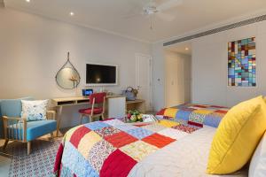 Postel nebo postele na pokoji v ubytování Maison De Camille Boutique Hotel