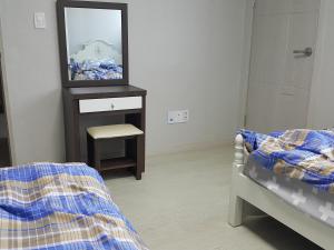 Postel nebo postele na pokoji v ubytování Guest House Manna