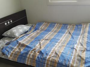 Postel nebo postele na pokoji v ubytování Guest House Manna