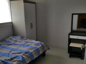 Postel nebo postele na pokoji v ubytování Guest House Manna