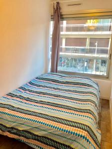 Een bed of bedden in een kamer bij Juan Soleil