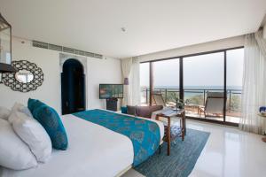 Postel nebo postele na pokoji v ubytování Marrakesh Hua Hin Resort & Spa