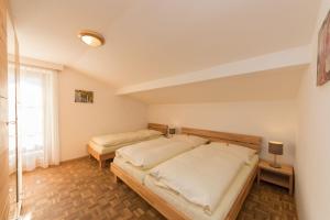 Posteľ alebo postele v izbe v ubytovaní Ferienhaus Hohenwarter