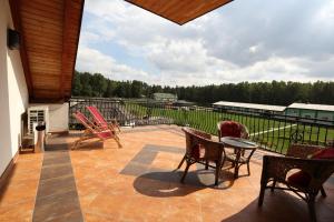 Balkón nebo terasa v ubytování Malutkie Resort