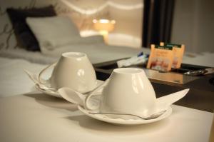 Cama ou camas em um quarto em ApartHostel Warszawa