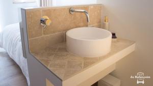 Ένα μπάνιο στο La balançoire