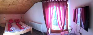 Łóżko lub łóżka w pokoju w obiekcie Pension & Apartments Waldkrieber