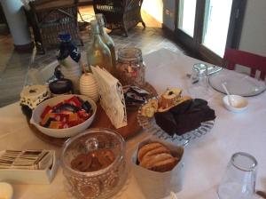 a table with a bunch of food on it at La Fenice in Carpi