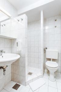 Koupelna v ubytování Jagodic Garni Hotel + 37 fotografií