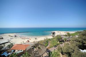 an aerial view of a beach and the ocean at Residence Hotel in Netanya