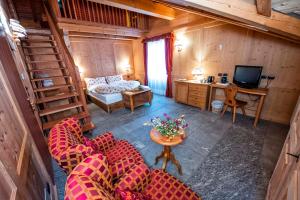 TV a/nebo společenská místnost v ubytování Hotel Jolanda Sport