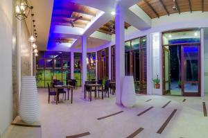Restoran või mõni muu söögikoht majutusasutuses Velana Beach Hotel Maldives