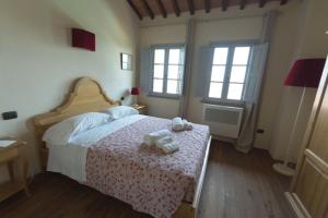 Letto o letti in una camera di Borgo in Chianni