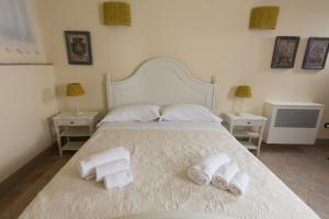 Letto o letti in una camera di Borgo in Chianni