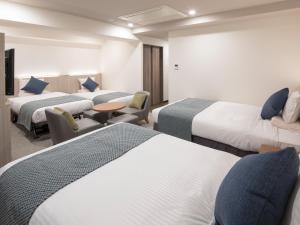 Postel nebo postele na pokoji v ubytování HOTEL MYSTAYS Midosuji Honmachi + 37 fotografií