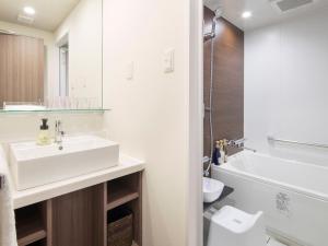 Koupelna v ubytování HOTEL MYSTAYS Midosuji Honmachi