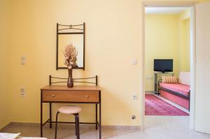 TV a/nebo společenská místnost v ubytování Manesi Apartments