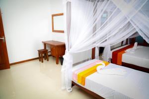 Letto o letti in una camera di BV Residence