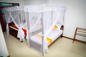 Letto o letti in una camera di BV Residence