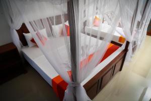 Letto o letti in una camera di BV Residence