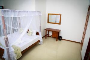 Letto o letti in una camera di BV Residence