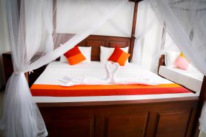 Letto o letti in una camera di BV Residence