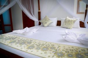 Letto o letti in una camera di BV Residence