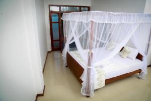 Letto o letti in una camera di BV Residence