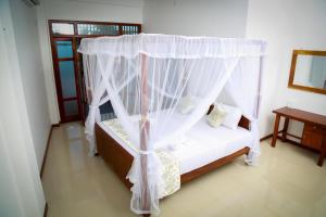Letto o letti in una camera di BV Residence