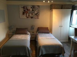 Een bed of bedden in een kamer bij Halte71