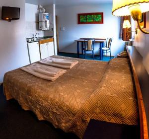 Postel nebo postele na pokoji v ubytování Apart Hotel Magali