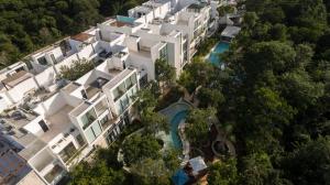an aerial view of a resort with a swimming pool at Anah Suites Tulum by Sunest in Akumal