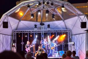 a group of people playing on a stage at Hotel Astoria Playa Adults Only 4* Sup in Port d'Alcudia