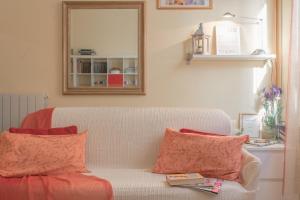A seating area at Apartment Pink21