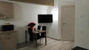 TV a/nebo společenská místnost v ubytování Villa Elisa